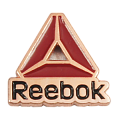 Значок в форме логотипа компании REEBOK